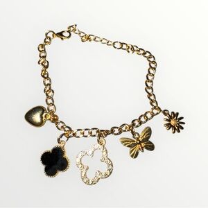 Gold Charm Bracelet with Black and Gold Accents